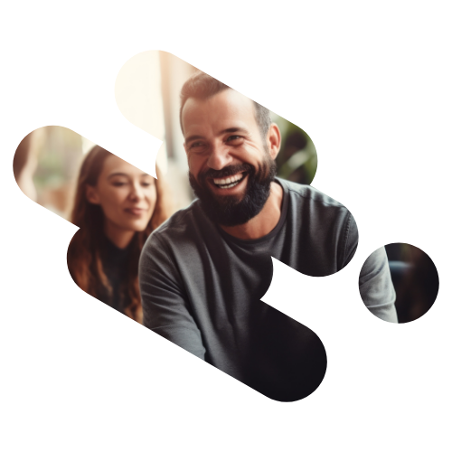 Stylized image of a man with a beard smiling, wearing a gray shirt, next to a woman with long hair. The photo features an artistic overlapping circular design and blurred background, capturing the essence of resilience and connection.